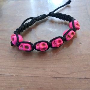 Pink and black skull bracelet